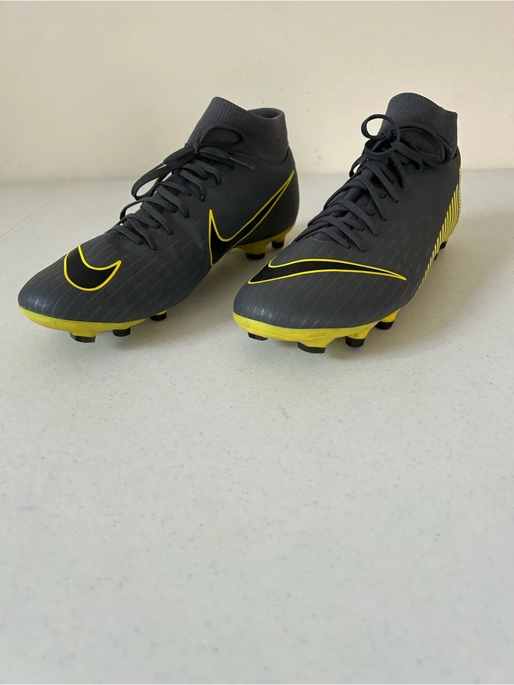 Nike Men’s Black Soccer Cleats with Yellow Swoosh